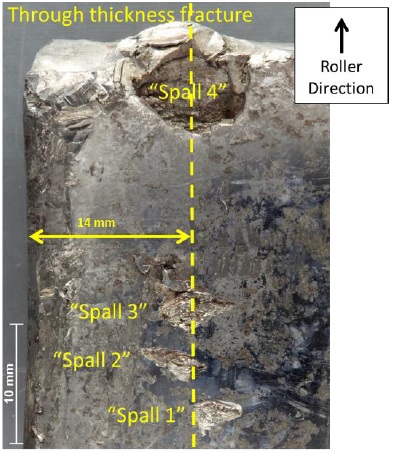 Spalling Found on teh Failed 2nd Stage Planet Gear from LN-OJF (Credit: AIBN/QinetiQ)