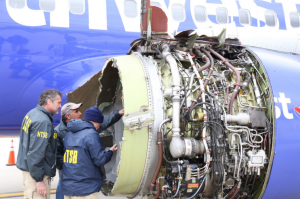 Investigators examine damage to Southwest B737-800 N772SW No 1 CFM56-7B Engine at Philadelphia (Credit: NTSB)