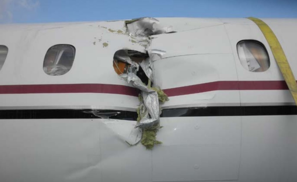 PenAir Saab 2000 N686PA Fuselage Damage (Credit: NTSB)