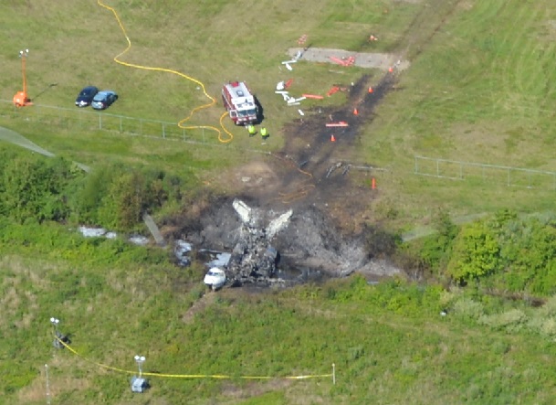 Wreckage of Gulfstream GIV N121JM at Bedford, MA (Credit: MSP via NTSB)