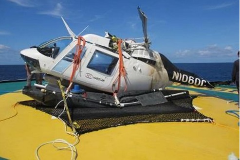 Wreckage of B206B N1060C on the Deck of a Fishing Vessel in the Pacific (Credit: Operator via NTSB)