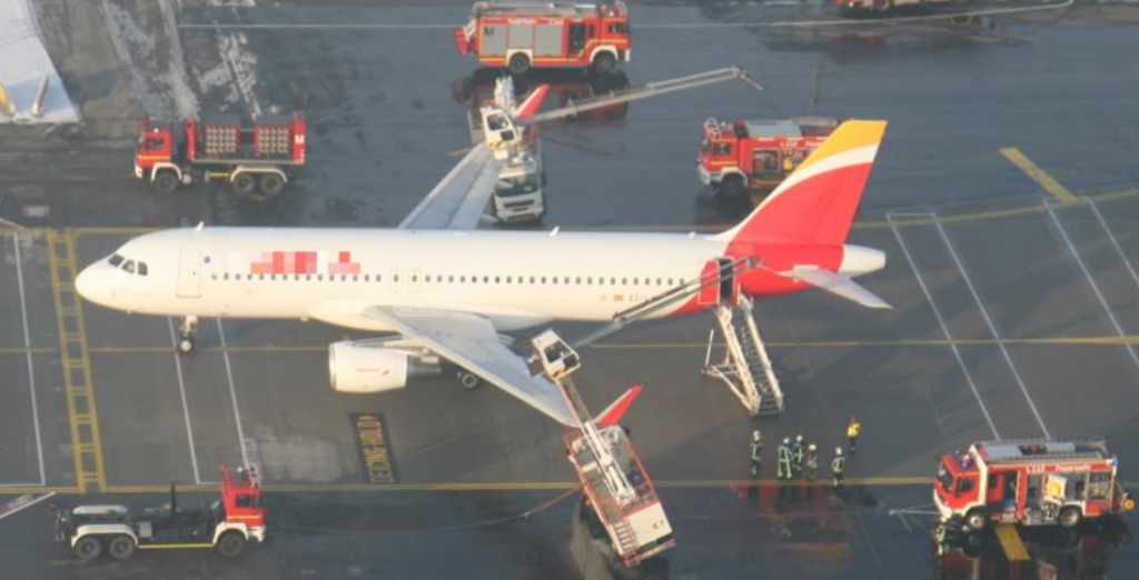 Iberia A320 EC-LVD at Munich in Contact with Two De-icing Trucks (Credit: Police via BFU who have redacted Identifying markings)