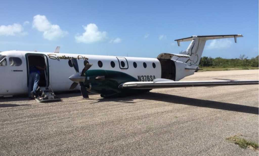 Beechcraft B1900C N376SA of Southern Air Charter After Wheel Up Landing at Deadman's Cay (Credit: Bahamas AAID)