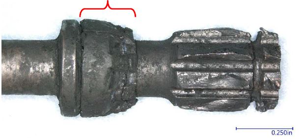 The drive shaft spacer installed on the drive shaft (red bracket) (Credit: NTSB)
