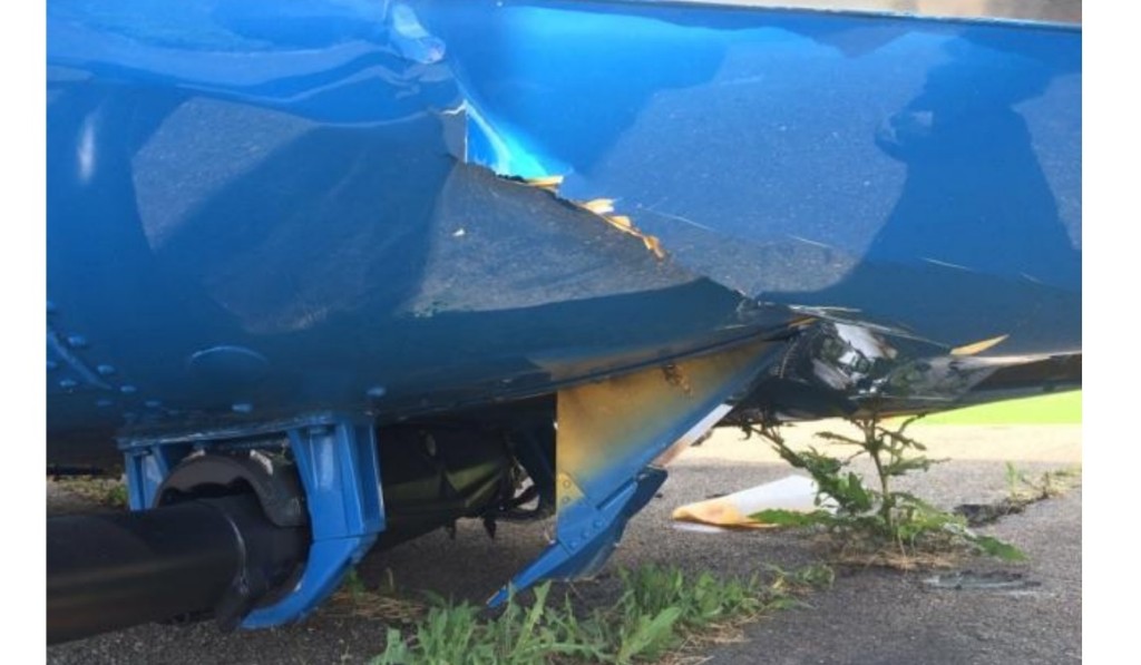 Damage to PHI B407 N4999: Note the Spread Skids and Crumpled Lower Fuselage (Credit: via NTSB)