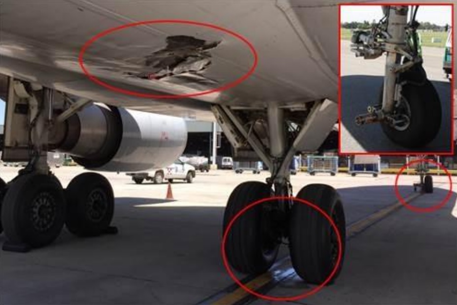 Damage to the Underside of Lufthansa Cargo MD-11F D-ALCM and Missing Nose Wheel (Credit: JIAAC)
