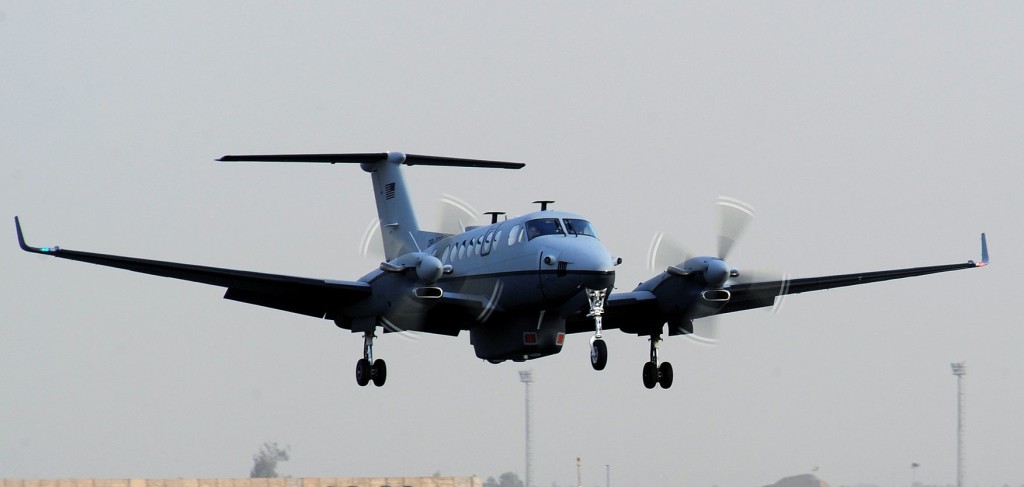 USAF Beechcraft MC-12W Liberty ISR King Air 350 Landing Showing the Large Ventral Pod with FLIR Turret Retracted.  Note this aircraft does not feature the Dorsal SATCOM Antenna (Credit: USAF / Senior Airman Tiffany Trojca)