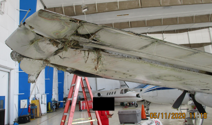 Ameriflight B1900C N31704 Damaged Left Wing (Credit: FAA via NTSB)