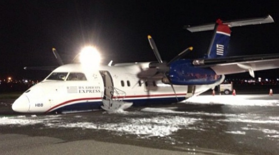 Piedmont / US Airways Express Bombardier Dash 8-100 N934HA at Newark after Wheel Up Laning (Credit: Sugznj)