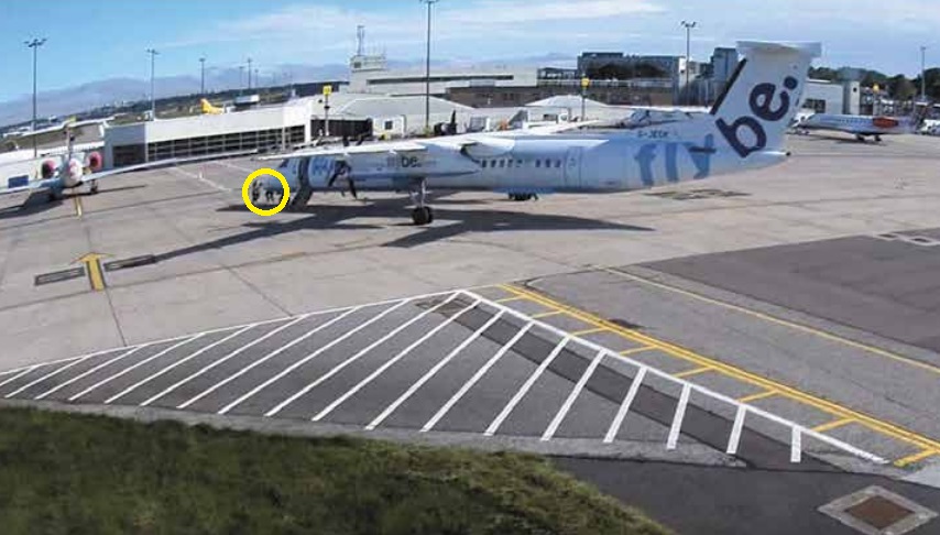 Former Flybe Bombardier Dash 8 Q400 G-JECK Gathering Speed as in Crosses Taxiway D at Aberdeen Airport as Ground Personnel Try In Vain to Slow It (Credit: AAIB)