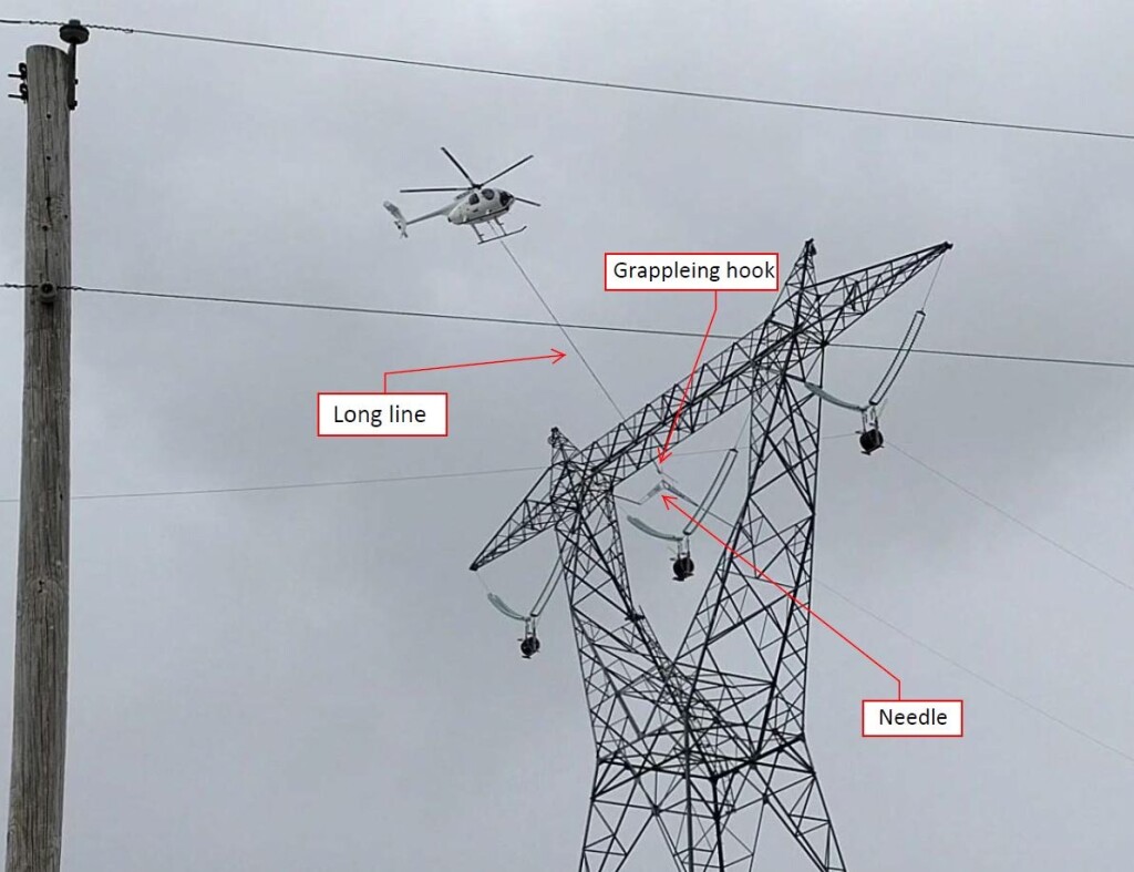 Rogers Helicopters MD 530F (369FF) N530KD Undertaking Stringing of Powerlines near Chalmers, Indiana (Credit: via NTSB)