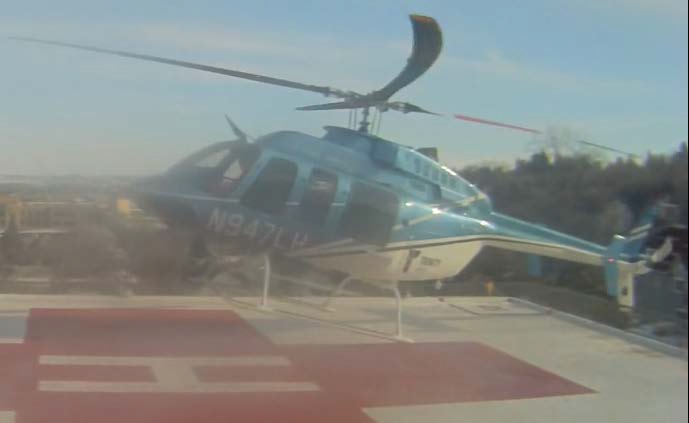 Still from Security CCTV of the Landing of Bell 407 N947LH at the Trinity Medical Helipad (Credit: via NTSB)