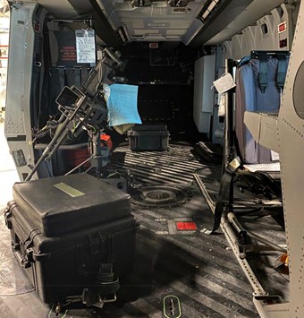 NH90 N-324: Cabin Layot with ROAM's Troopseat, Automatic Weapon and Shooting Box (with padded seat), in the Right Hand Doorway (working forwards) (Credit:  IVD)
